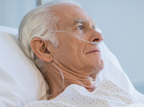 Old man in hospital with a chronic health problem.